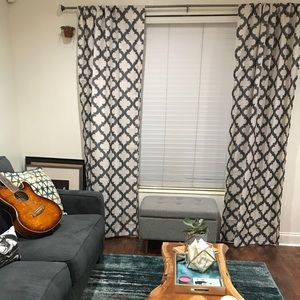 Grey and beige curtain panels